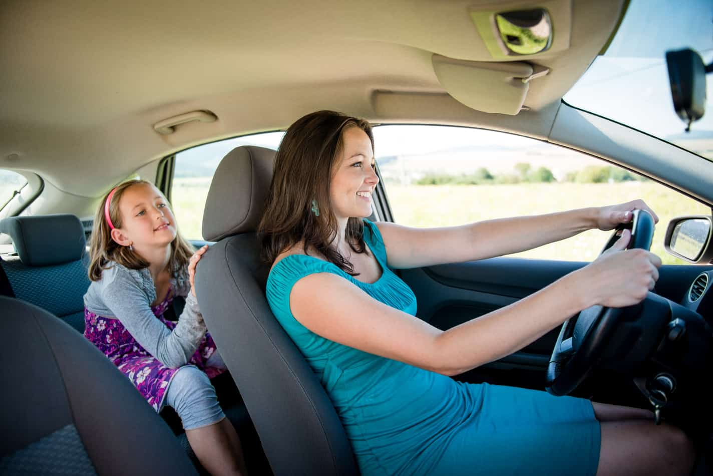 At what age can you sit in the front of a outlet car